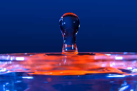 figures and shapes of water produced by splash photographed very closely with selective focusの写真素材