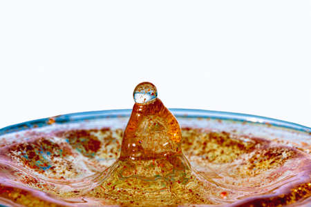 figures and shapes of water produced by splash photographed very closely with selective focusの写真素材