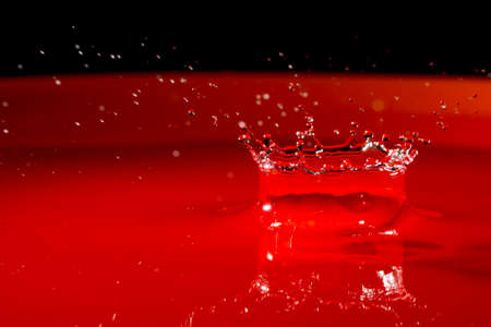 figures and shapes of water produced by splash photographed very closely with selective focusの写真素材