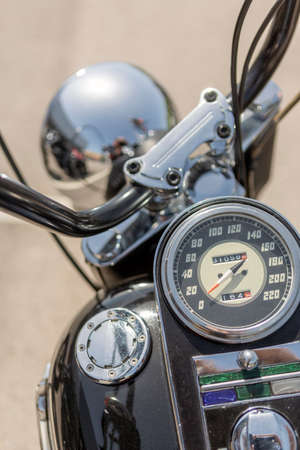 close-up photo of motorcycle speedometer with selective focusing