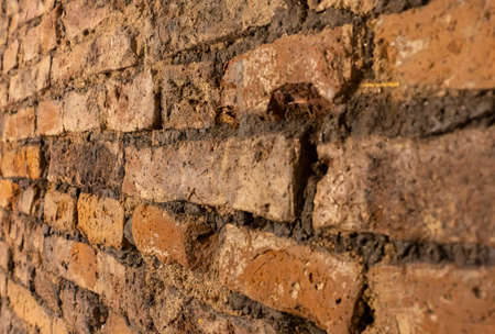photo of old antique brick wall fence, background or texture conceptの写真素材