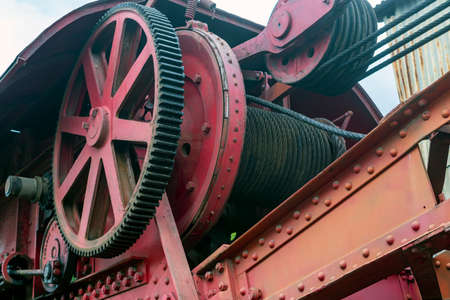 photo of machinery with coil of large steel cable of large sizeの写真素材