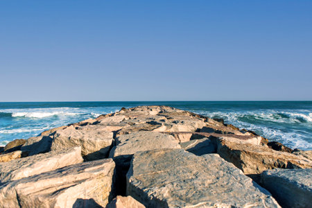 spectacular view of rock breakwaterの写真素材