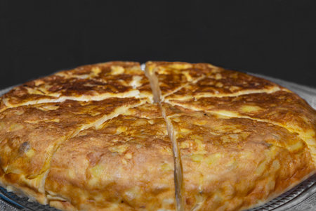 potato omelette cut in portions, typical Spanish gastronomy food.の写真素材