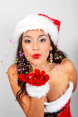 woman with Santa Claus dress on white backgroundの写真素材