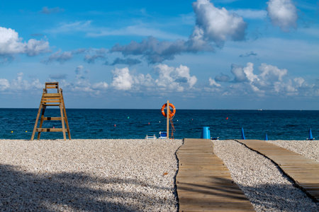 Lifeguard tower on the beach in a beautiful summer day, Italyの写真素材