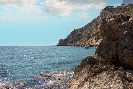 rocky coast on a sunny day a calm seaの写真素材