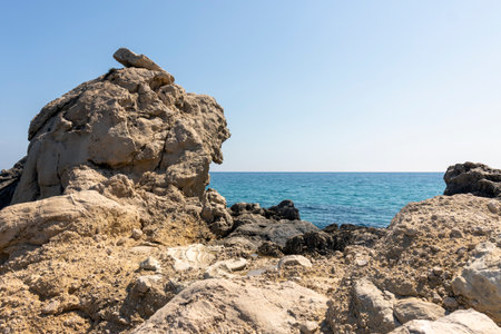 rocky coast on a sunny day a calm seaの写真素材