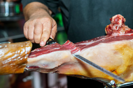 specialist person cutting iberian hamの写真素材