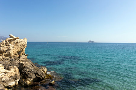 rocky coast on a sunny day a calm seaの写真素材