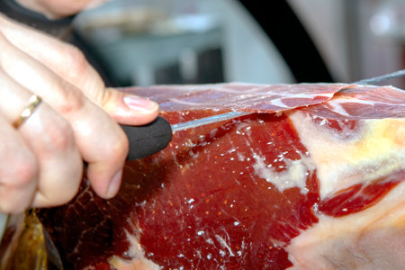 close up of iberian ham slicingの写真素材