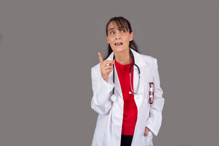 doctor woman with thoughtful expression isolated from the backgroundの写真素材