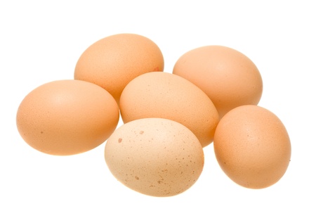 six brown organic eggs isolated on white background