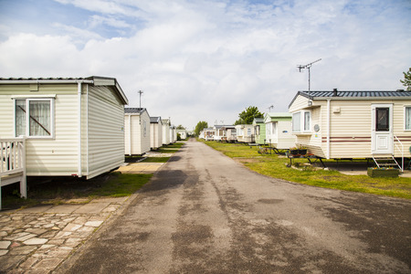 Two rows of static caravans on a typical british summer holiday parkのeditorial素材