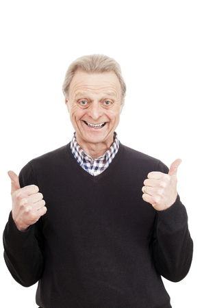 Happy old man senior two thumbs up isolated on white backgroundの写真素材
