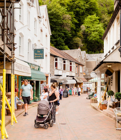 Somerset, Uk, England May 18, 2022: Tourist Tourists and Shops In Lynmouth Street Lynmouth North Devon Englandのeditorial素材