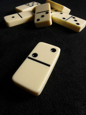 Macro photo of dominoes on black backgroundの写真素材