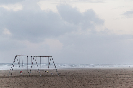 a swing by the beach in the Oregon coastlineの写真素材