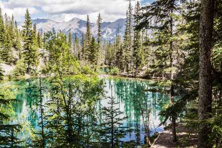 Grassi Lakes. two majestic turquoise lakes.  Panoramic views of Canmore Grassi Lakes is also a popular rock climbing spot.の写真素材