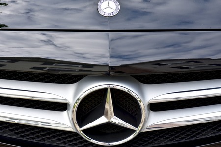 MARYLAND, USA - 2016: The front end of a Mercedes-Benz displaying the Mercedes symbolのeditorial素材