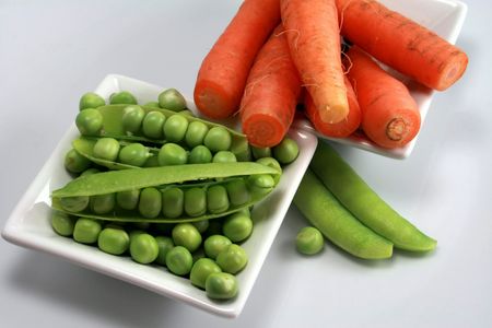 Peas and organic carrotsの写真素材
