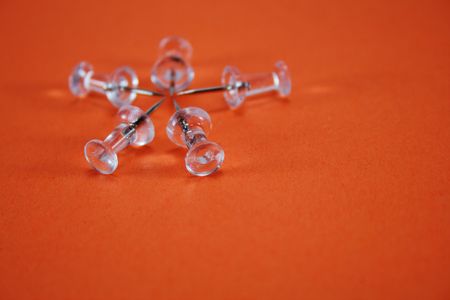 Pins on an orange backgroundの写真素材