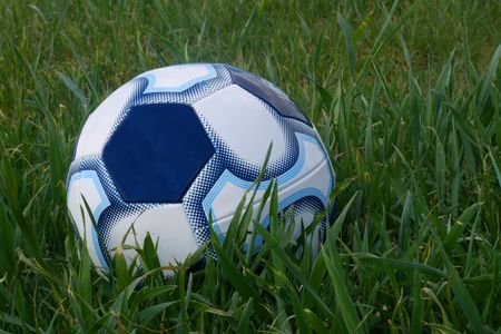 Soccerball in the grassの写真素材