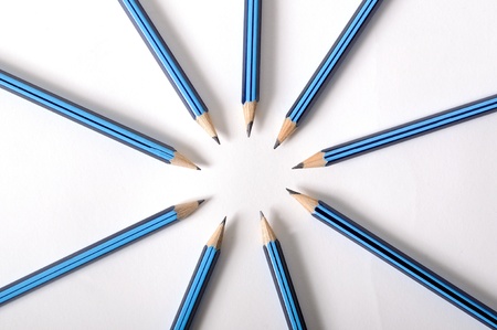 Close up detail of pencils arranged in a circle with points facing inwardsの写真素材