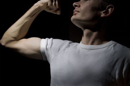 A man in a power pose, symbolising uprising or vengeanceの写真素材