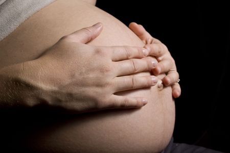 Pregnant Woman holding her belly