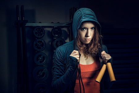 Young female training in a gym