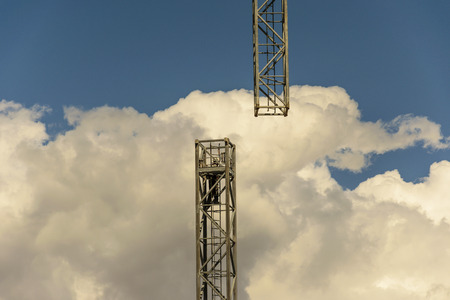 An operator after separating a module from the crane tower for disassemblyの写真素材