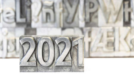 Happy new year 2021 on background with press typesの写真素材