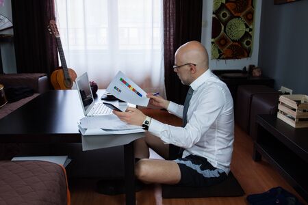 Man working at home. Confinement by coronavirus.の写真素材