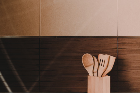 Spoon stick in rustic kitchenの写真素材