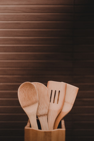 Spoon stick in rustic kitchenの写真素材