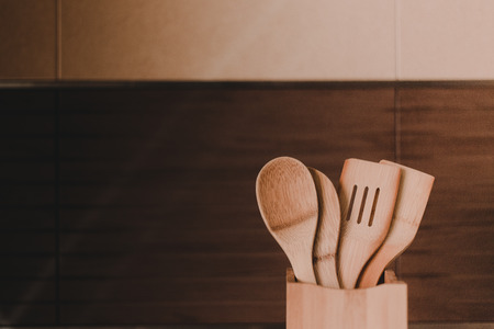 Spoon stick in rustic kitchenの写真素材