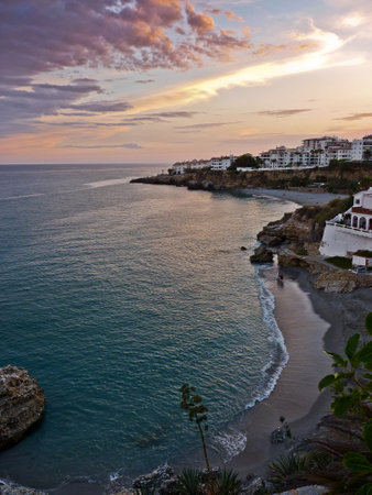 Sunset over the sea in Nerja, Andalucia, Spainの写真素材