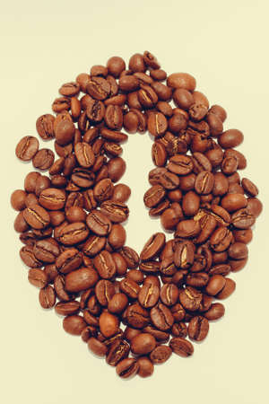 isolated coffee bean made from coffee beans on a white backgroundの写真素材