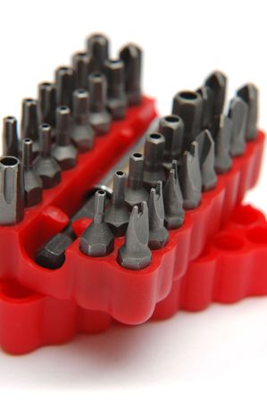 Closeup of a tiny screwdriver set on white background