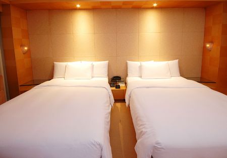 A warm and cosy bedroom in a hotel