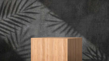 Wooden pedestal display stand for product show with trees shadow on concrete wall. 3D rendering.の写真素材