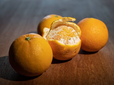 tangerines on a wooden tableの写真素材