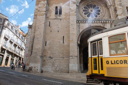 typical tramways circulating through the streets of Lisbonの写真素材