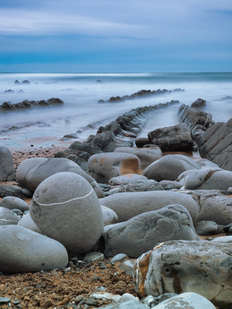 Layered rock formations on a Spanish coast - A long exposure shot of the striking flysch rock...