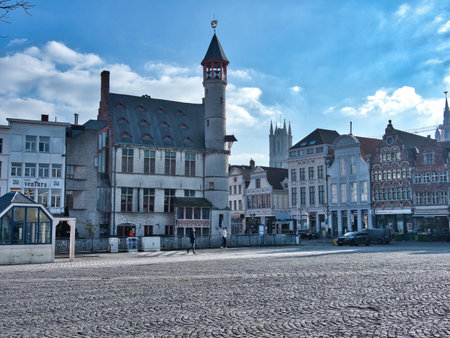 Old Meat Hall and Cobblestone Square in Ghent - A view of the historic Groot Vleeshuis (Old Meat Hall) and the surrounding square on a sunny day in Ghent, Belgium.の写真素材