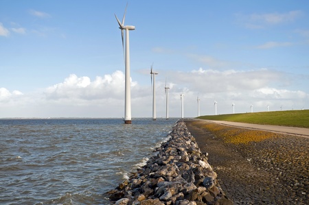 Windmills and a dam, Hollandの写真素材