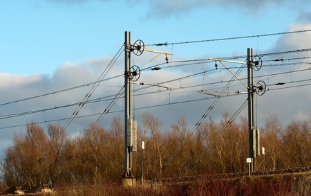 Overhead lines for trains in winterの写真素材