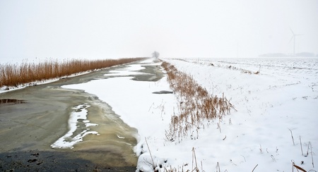 Frozen canal in winterの写真素材