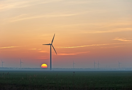 Sunrise and wind energy in winter